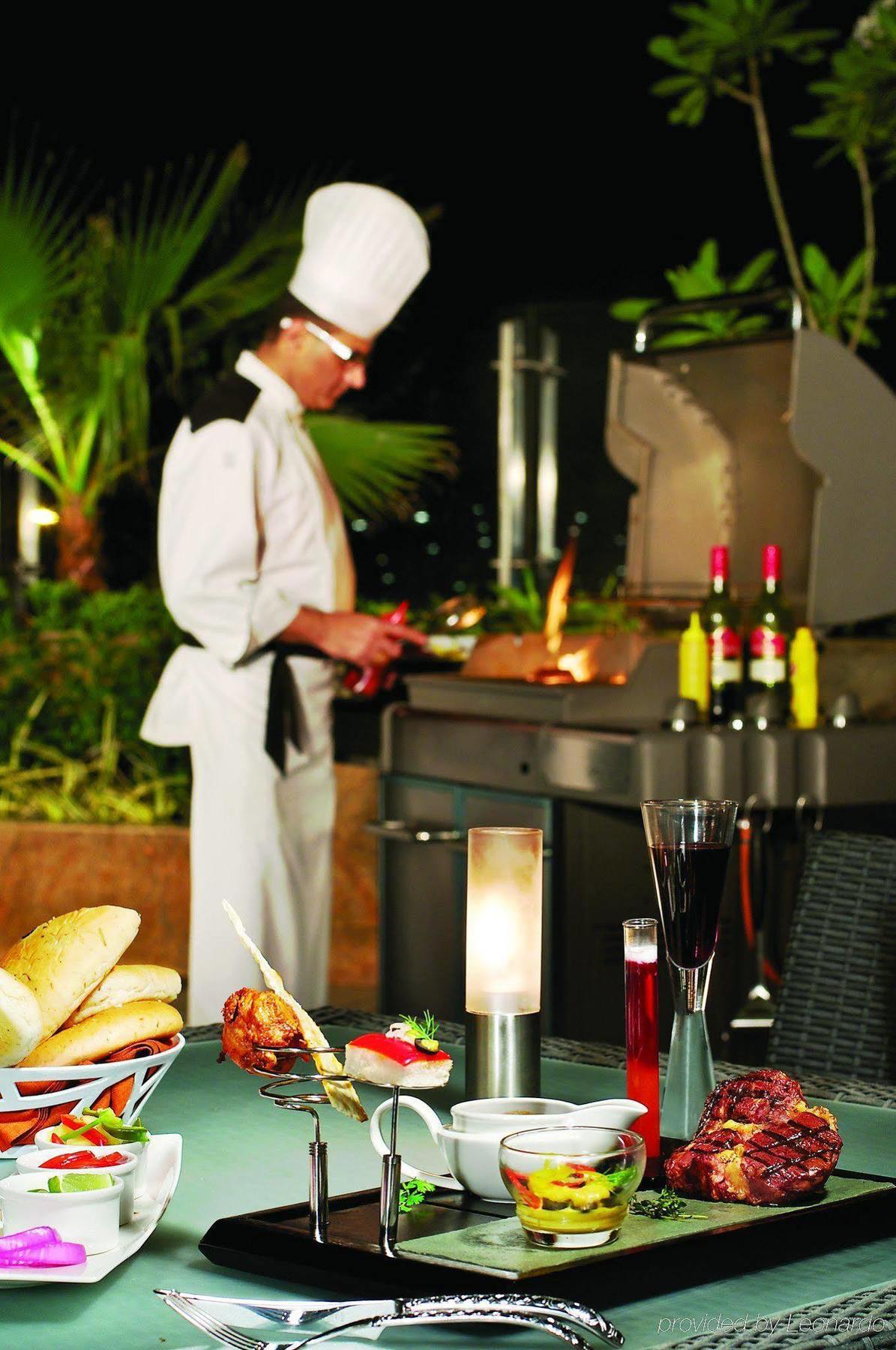 Vivanta Hyderabad, Begumpet Bagian luar foto A chef at work